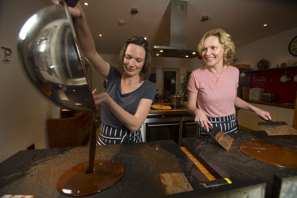 Natalie and Karen Keane from Bean &amp; Goose homemade craft chocolate are in Ferns, Co Wexford. Pictured tempering the chocolate. Picture: Patrick Browne