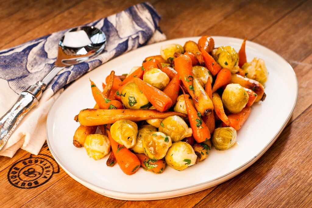 Beef dripping sticky roast parsnips, Chantenay carrots, glazed sprouts & apples